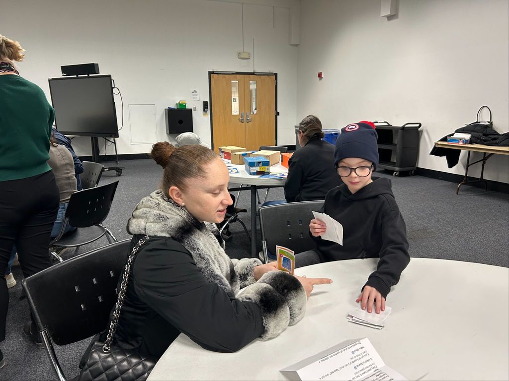 mother and son do Hebrew activity