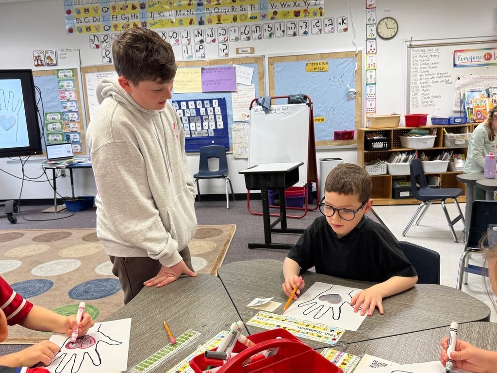 seventh grader helps second grader