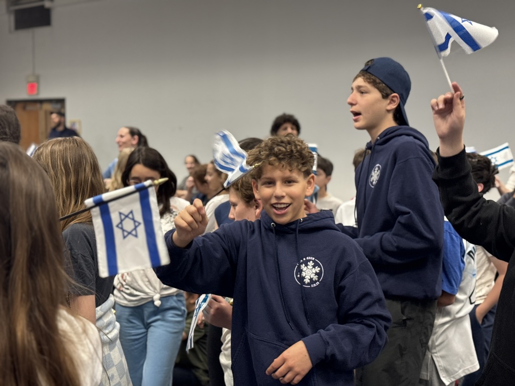 student waves Israeli flag
