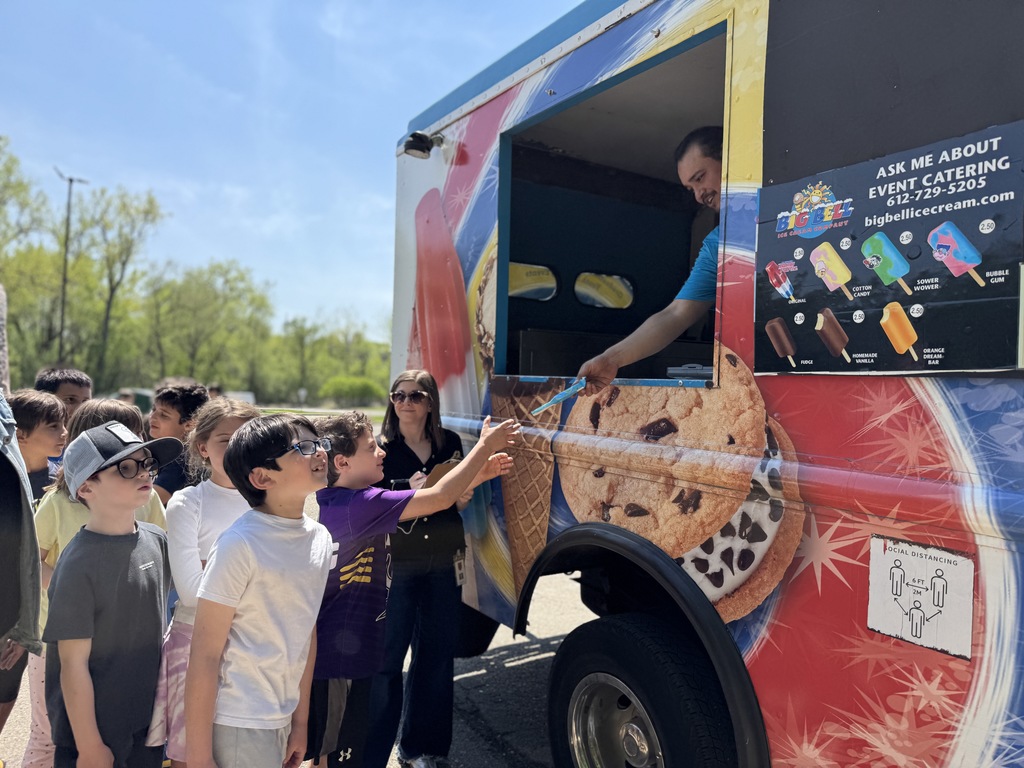 students get ice cream from ice cream truck