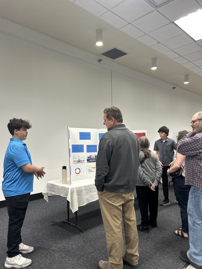 eighth grader presents to Dr. Dan