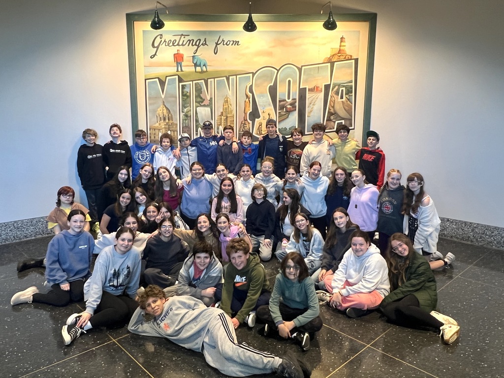 middle school in front of Minnesota sign