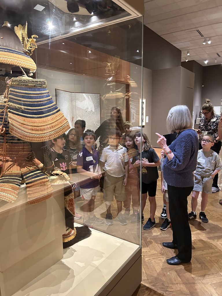students look at art