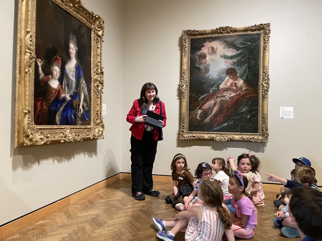 students look at art
