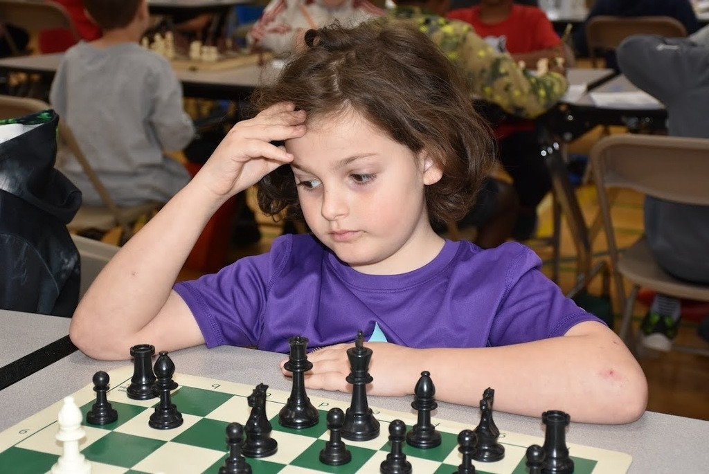 student plays chess