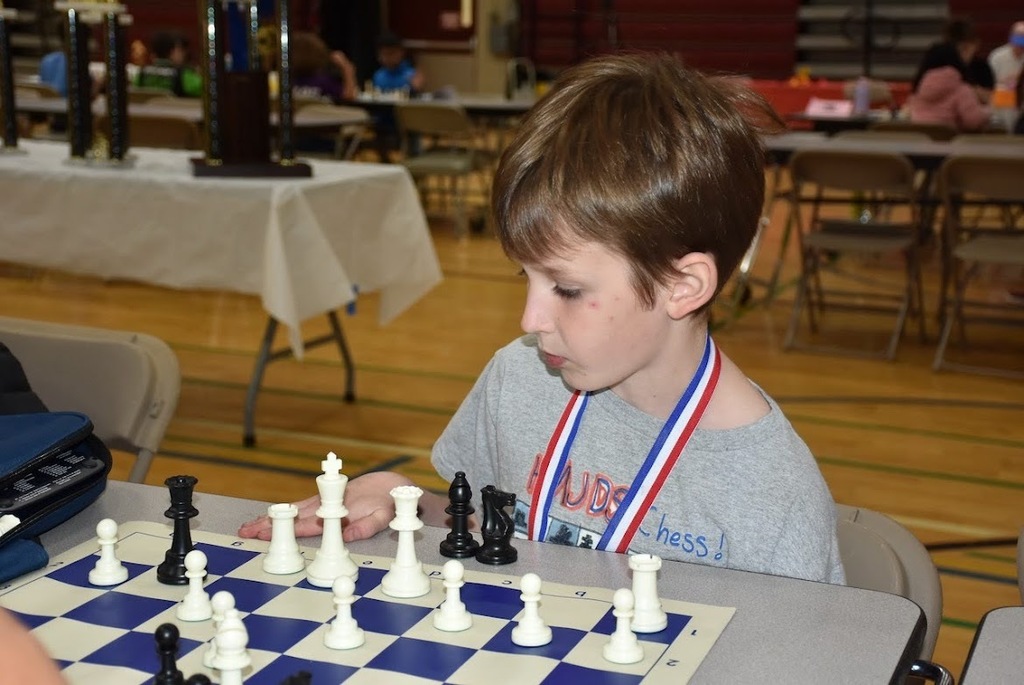 student plays chess