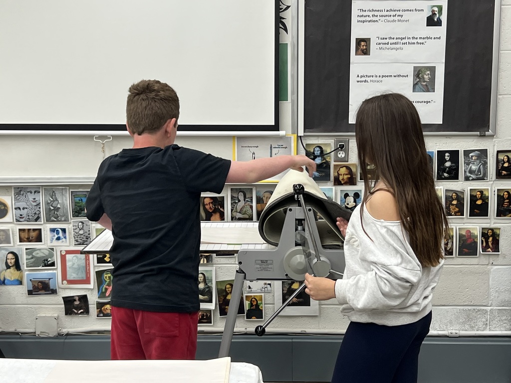 students use printing press