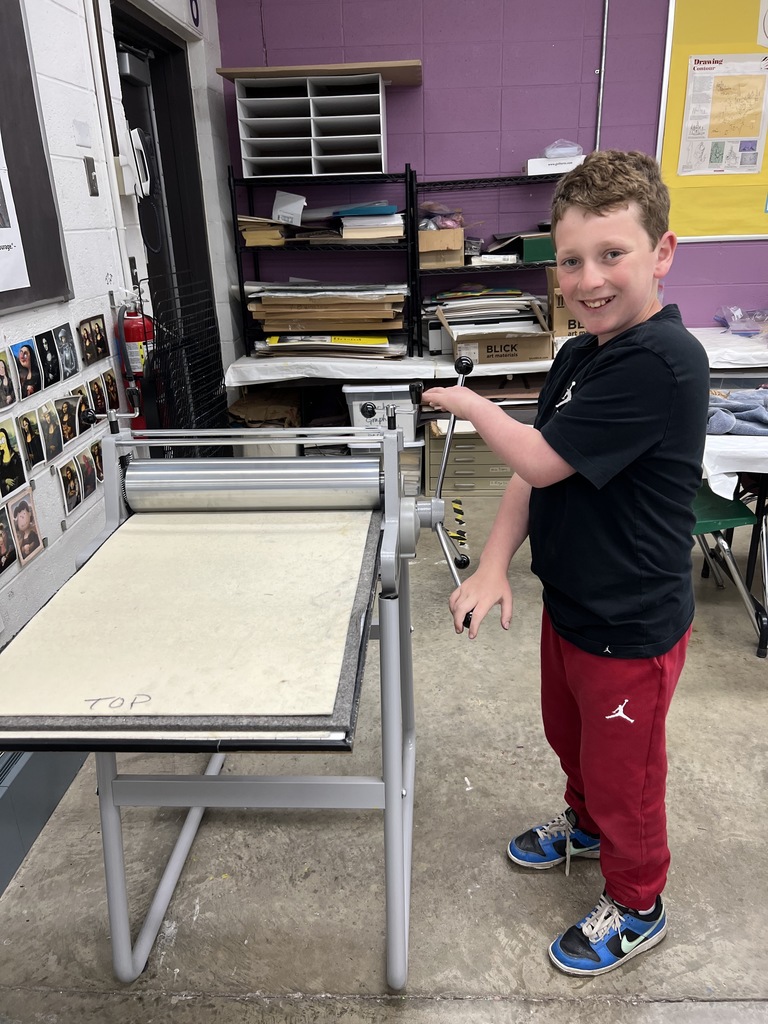 student turns printing press