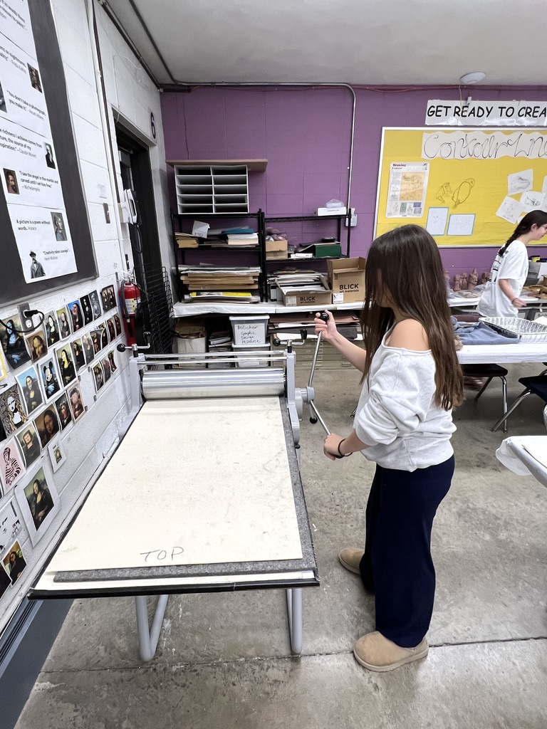 student turns printing press