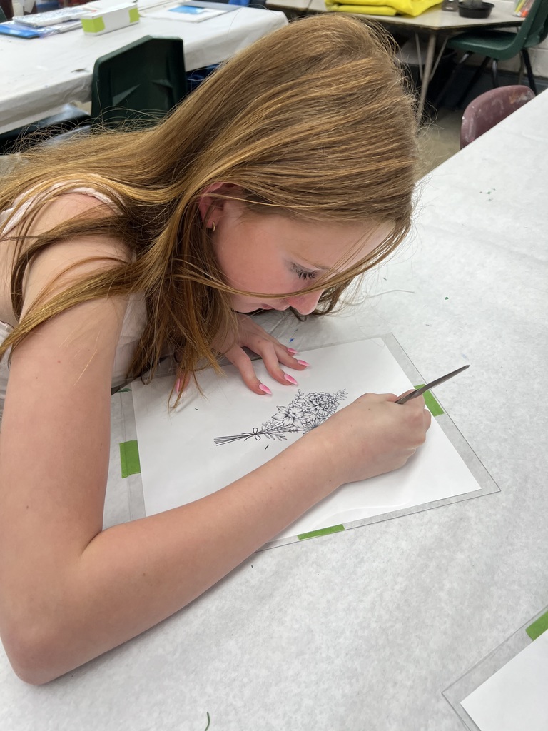 student draws design
