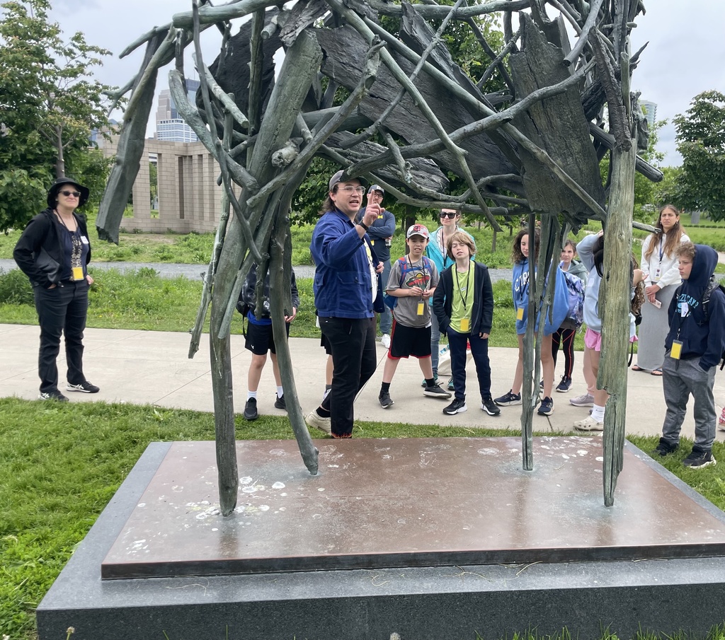 students look at scultpure