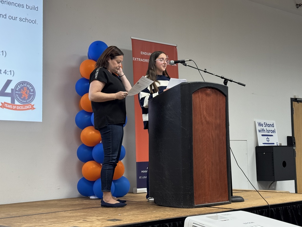 Student Sylvia G. and PTO Co-Chair Michele Kaplan Clinard speak