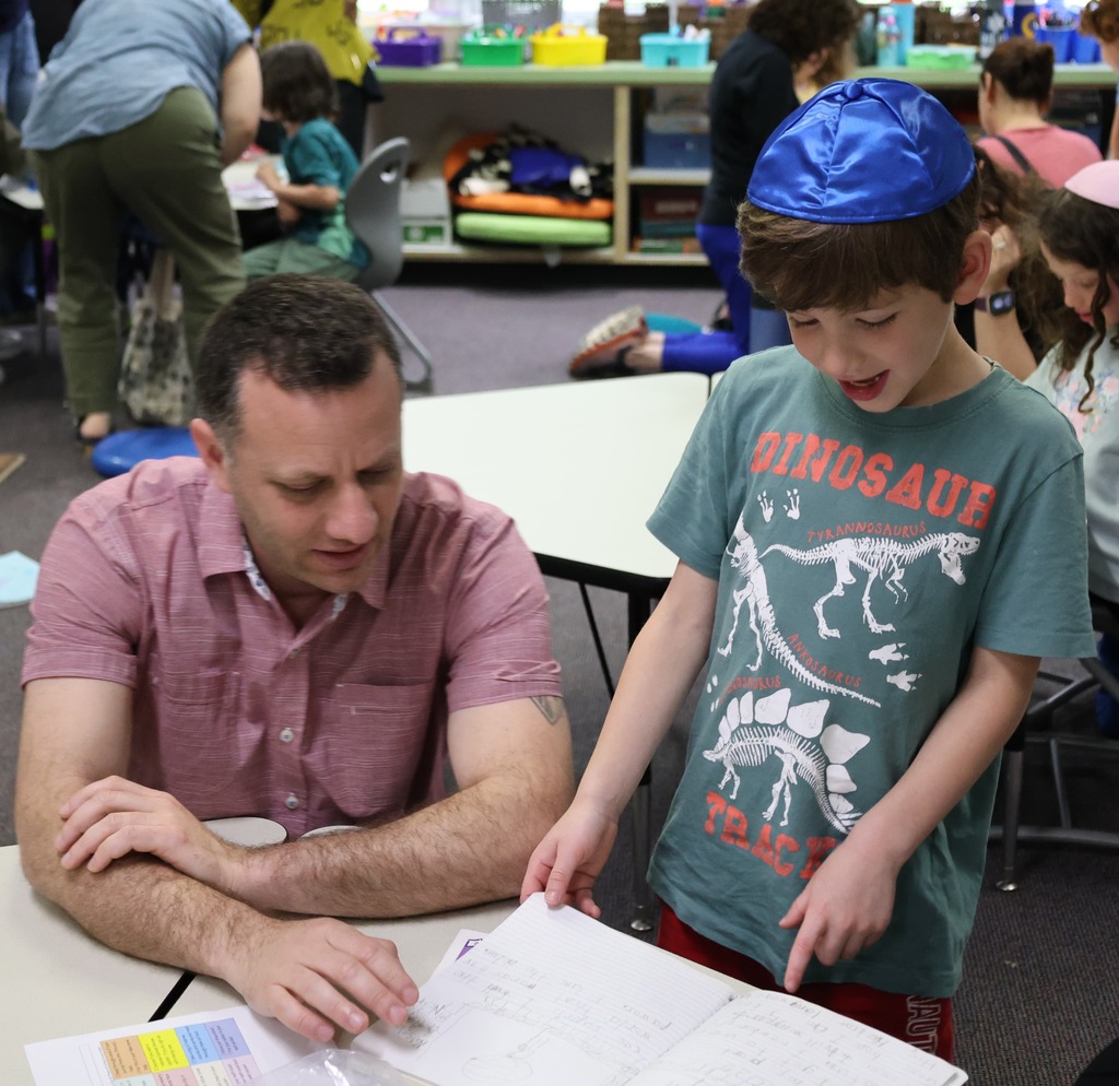 student shows parent work