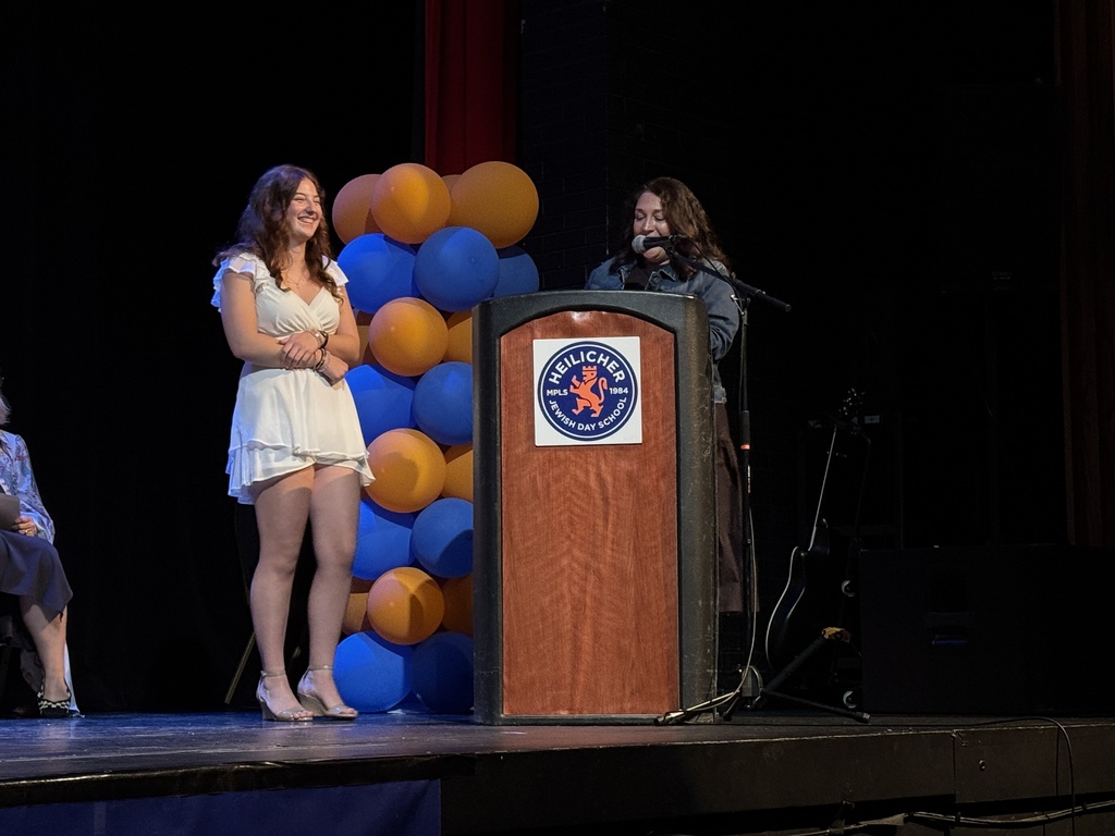 teacher speaks to eighth grader