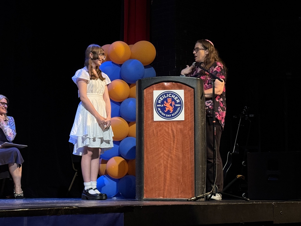 teacher speaks to eighth grader