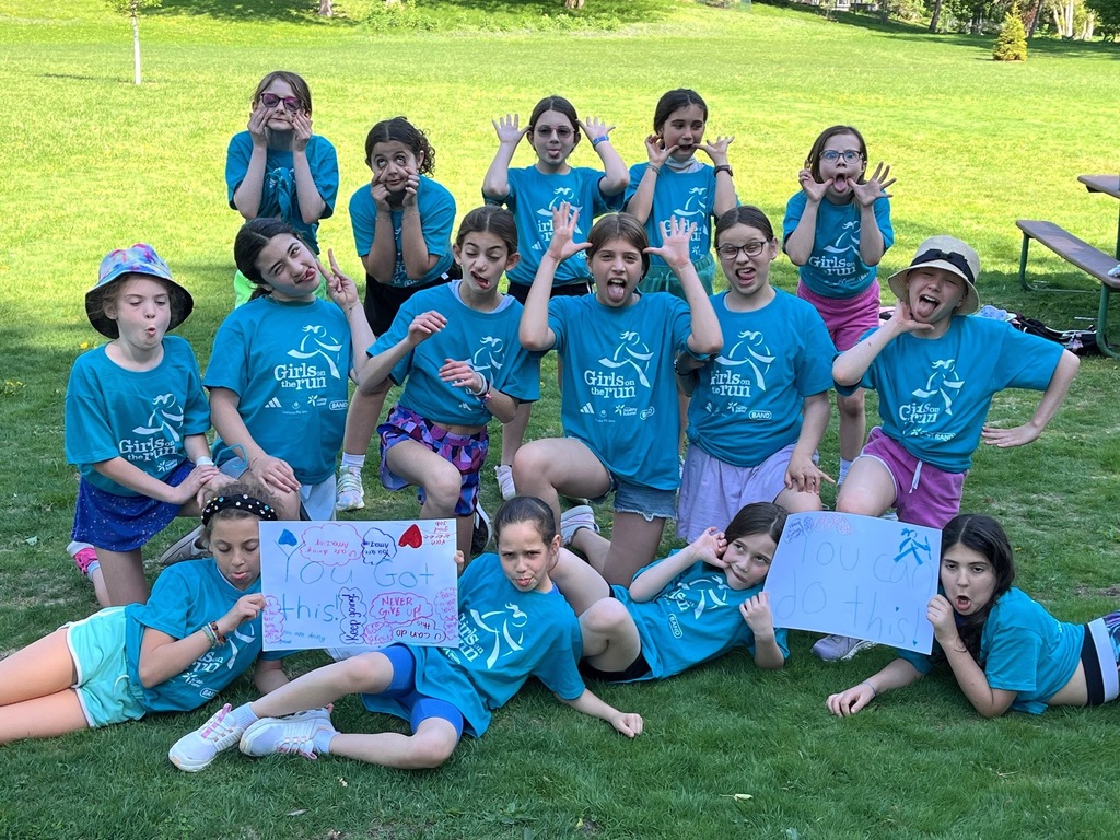 Girls on the Run team makes silly faces