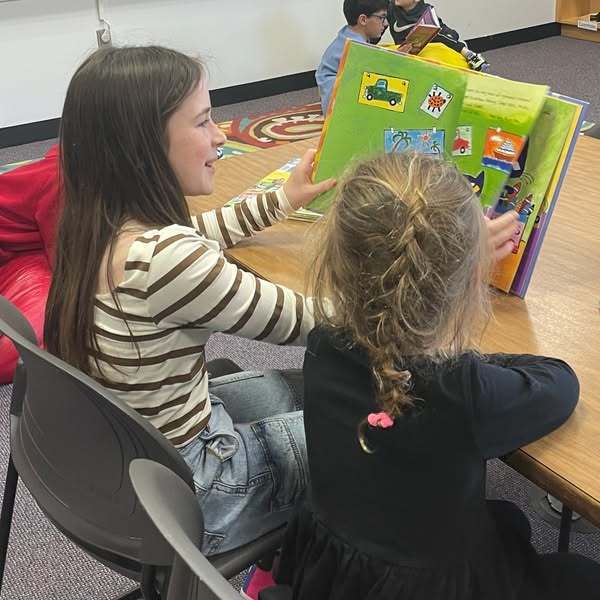 Smith sixth grader reads to HaLev pre-Ker