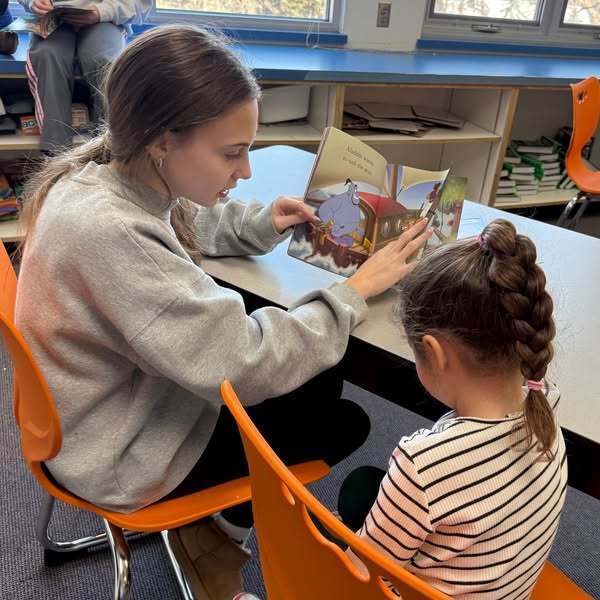 Smith sixth grader reads to HaLev pre-Ker