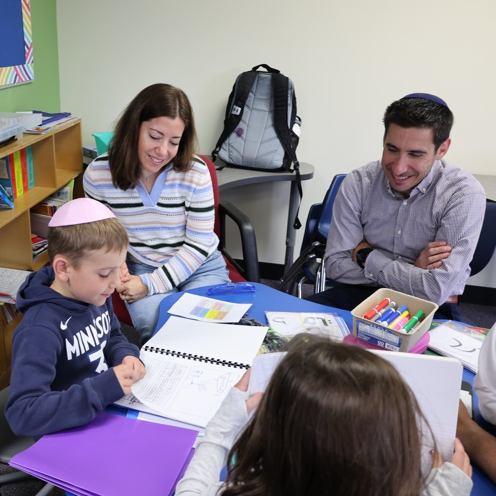 student shows parents work