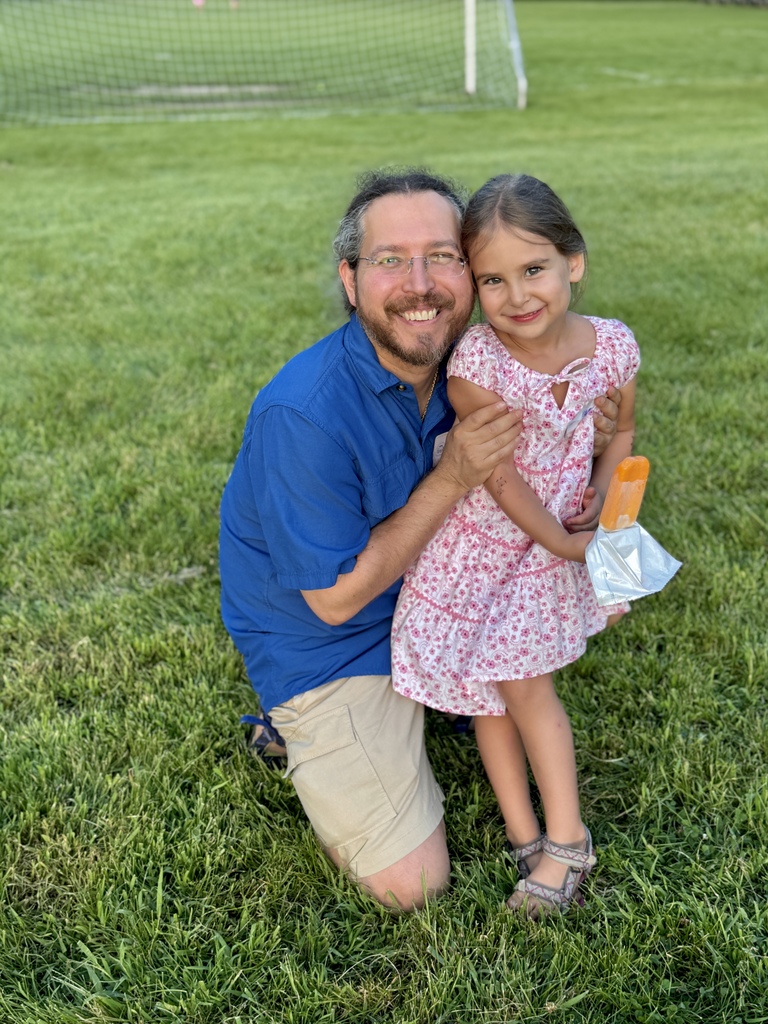 grownup and child smile with ice cream