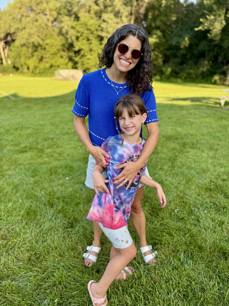 mom and daughter smile