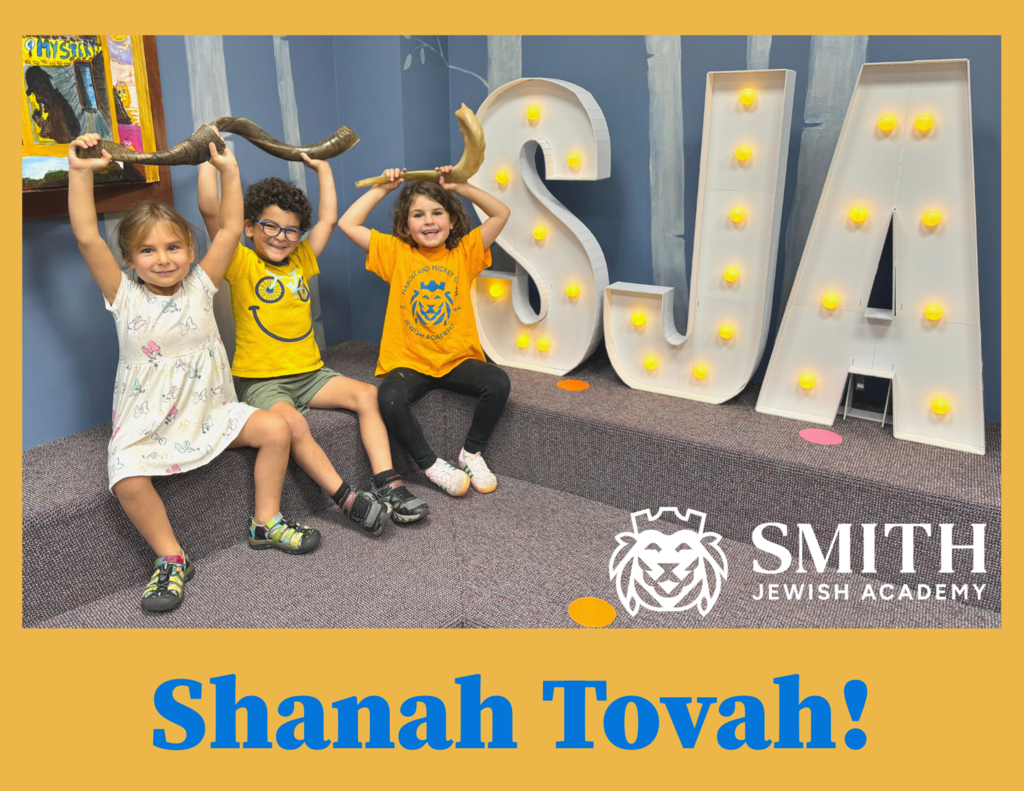 students hold shofars. Shanah tovah