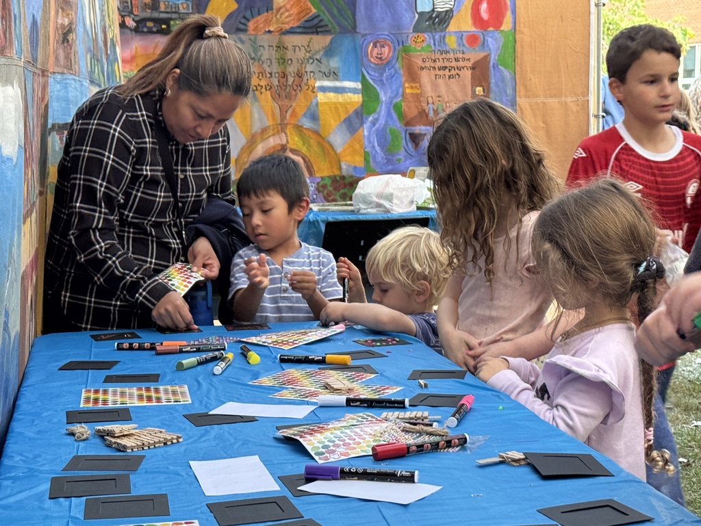 children and mother decorate frames