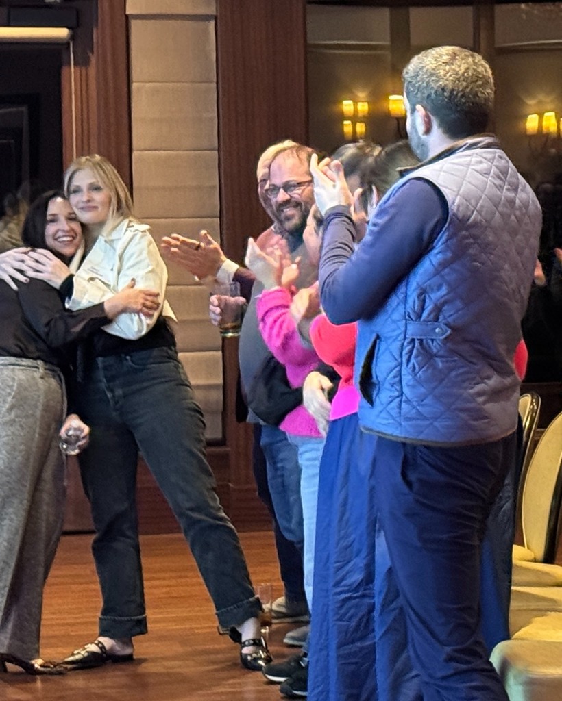 audience gives standing ovation