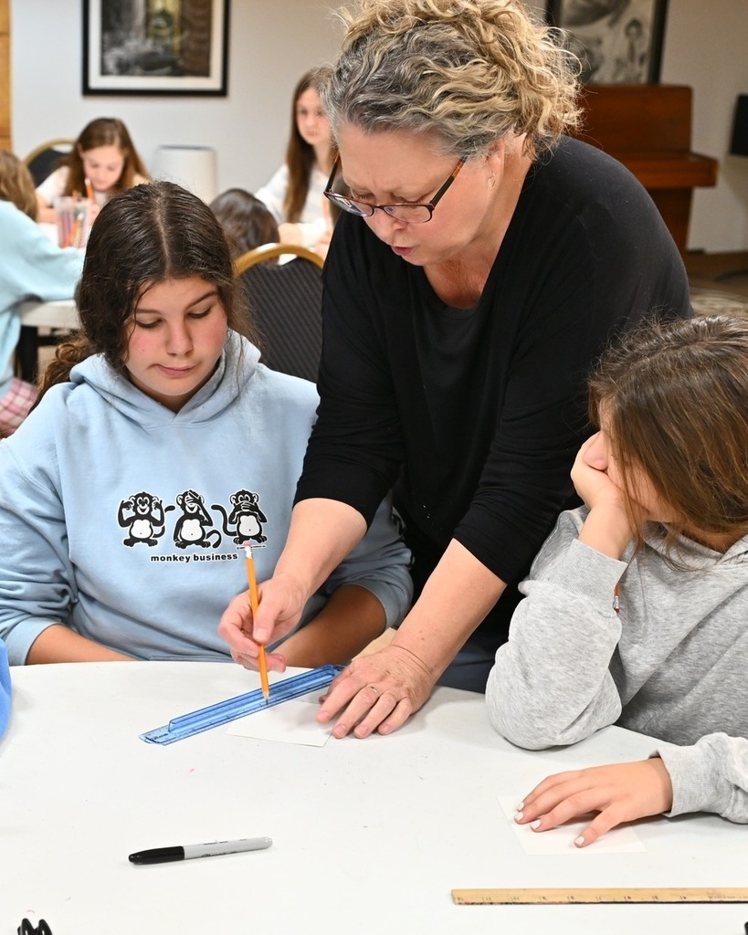 art teacher helps student