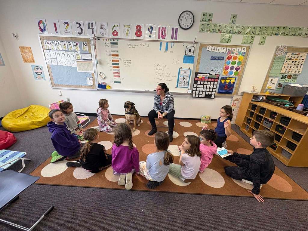 security dog sits with first graders