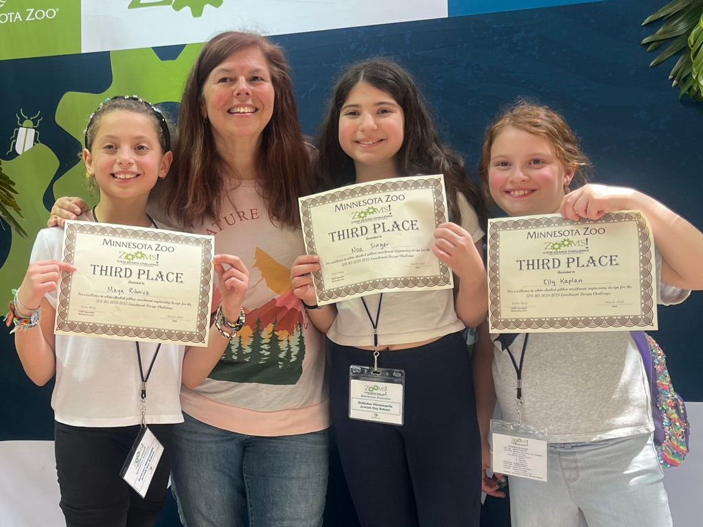 ZOOMS challenge winners and teacher with certificates