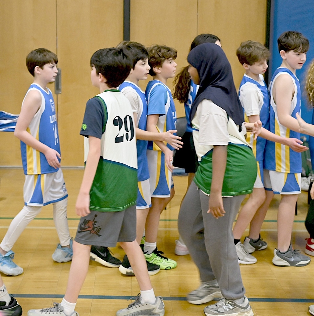 basketball teams high five each other