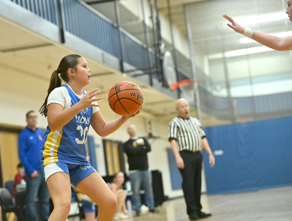 basketball player catches ball