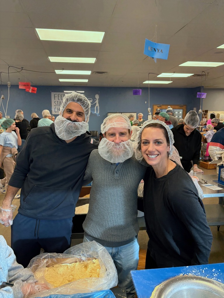 SJA parents at Feed My Starving Children