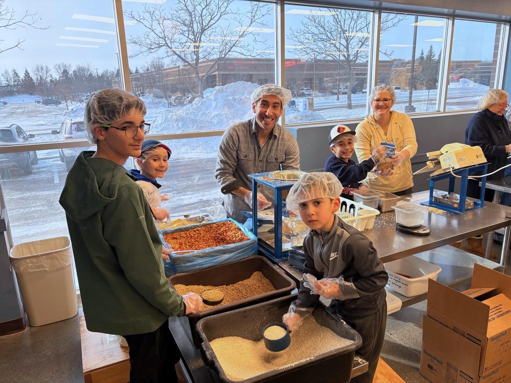 SJA families pack meals at Feed My Starving Children