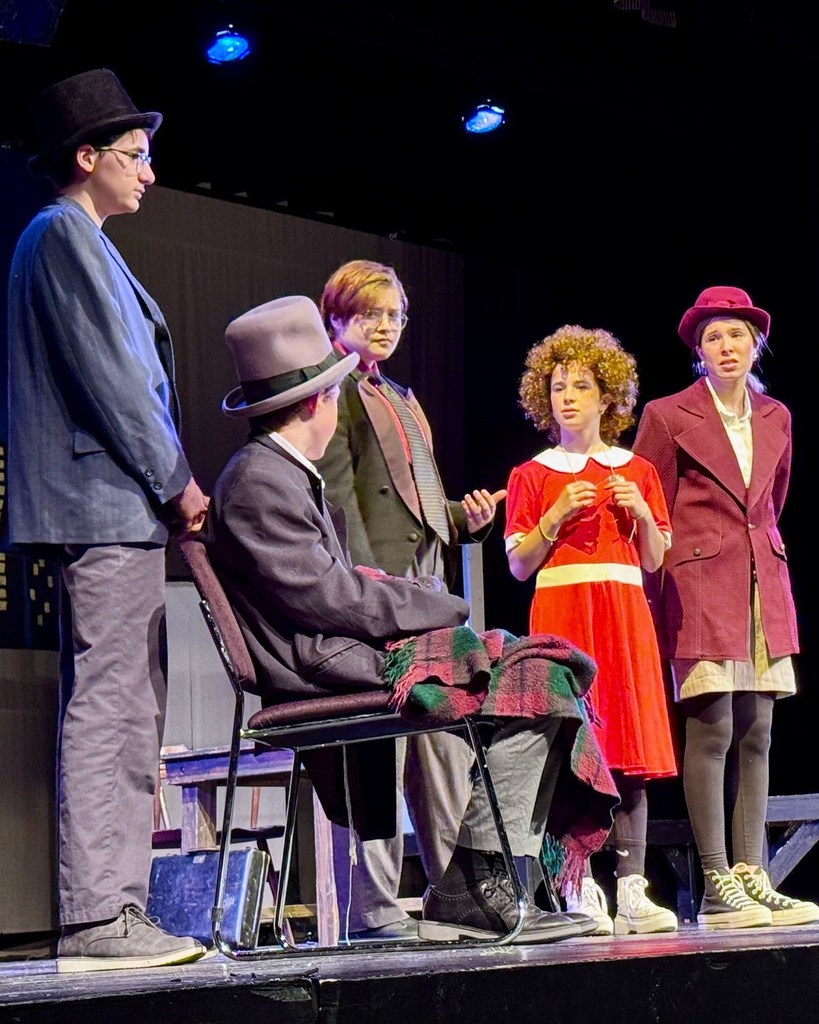 Annie, Mr. Warbucks, and Grace speak with President Roosevelt