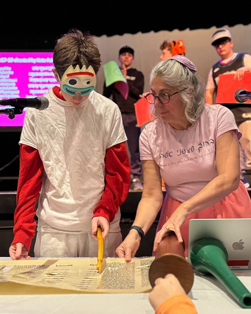 eighth grader reads Megillah