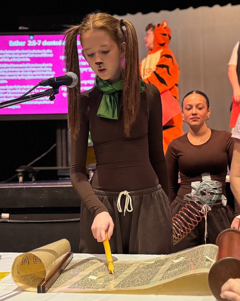 eighth grader reads Megillah