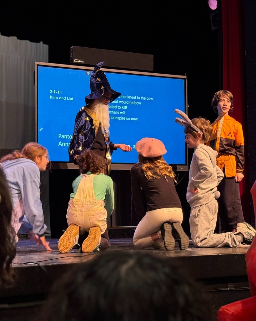 students perform Purim skit during Megillah reading