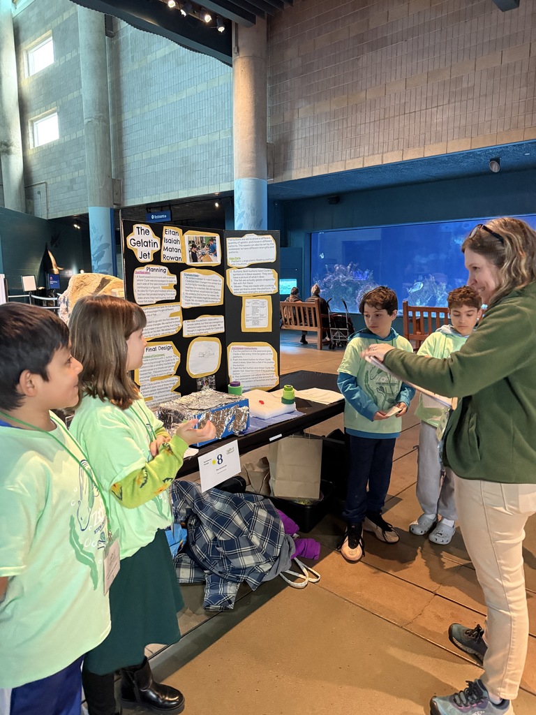 third grade team presents enrichment design to ZOOMS judge