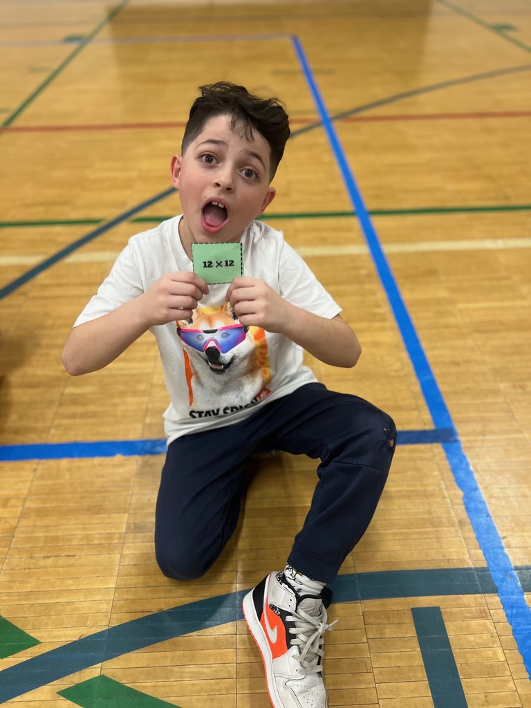 student shows equation during multiplication freeze tag