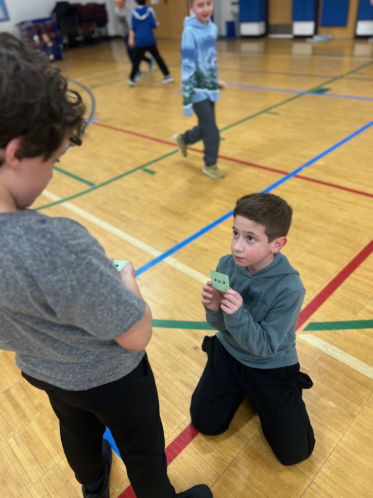 student shows equation in multiplication freeze tag