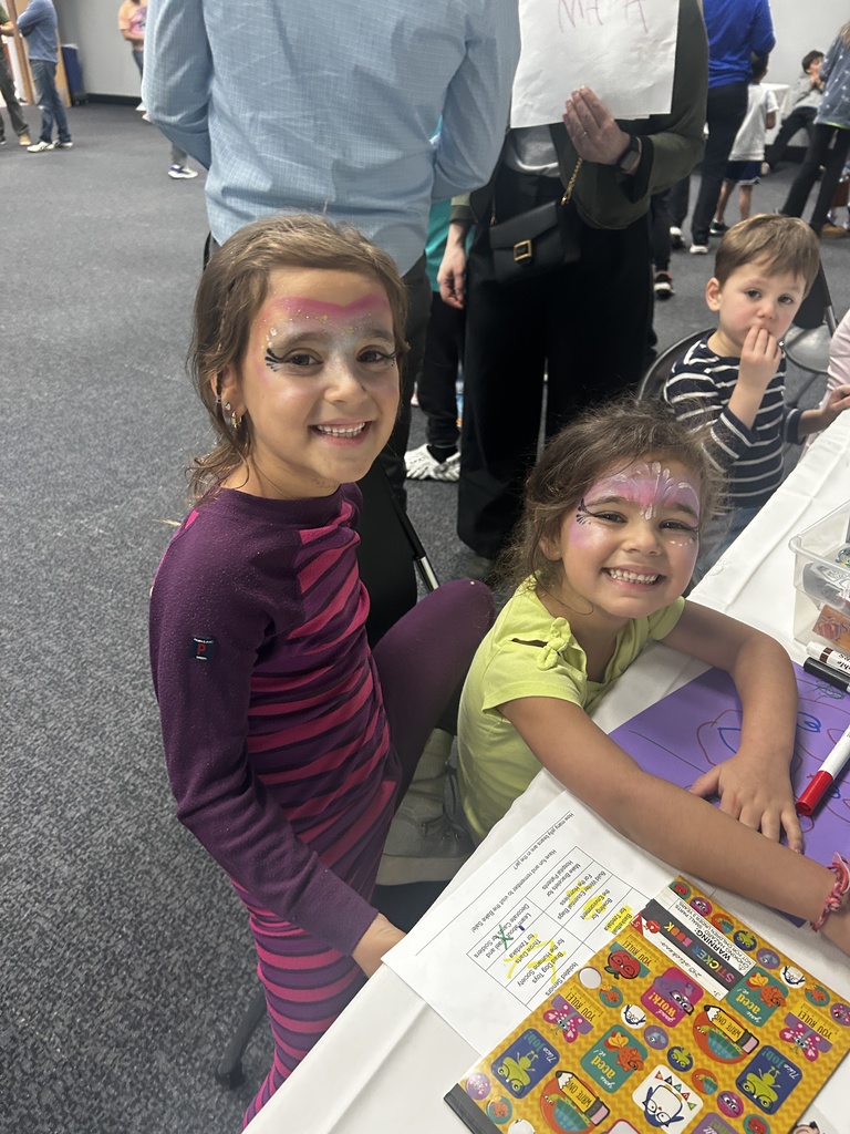 children with face paint make cards