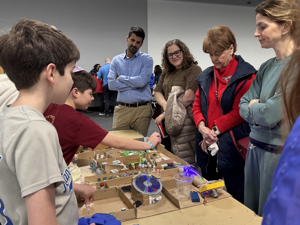 fifth grade students present mars colony model to parents and grandparents
