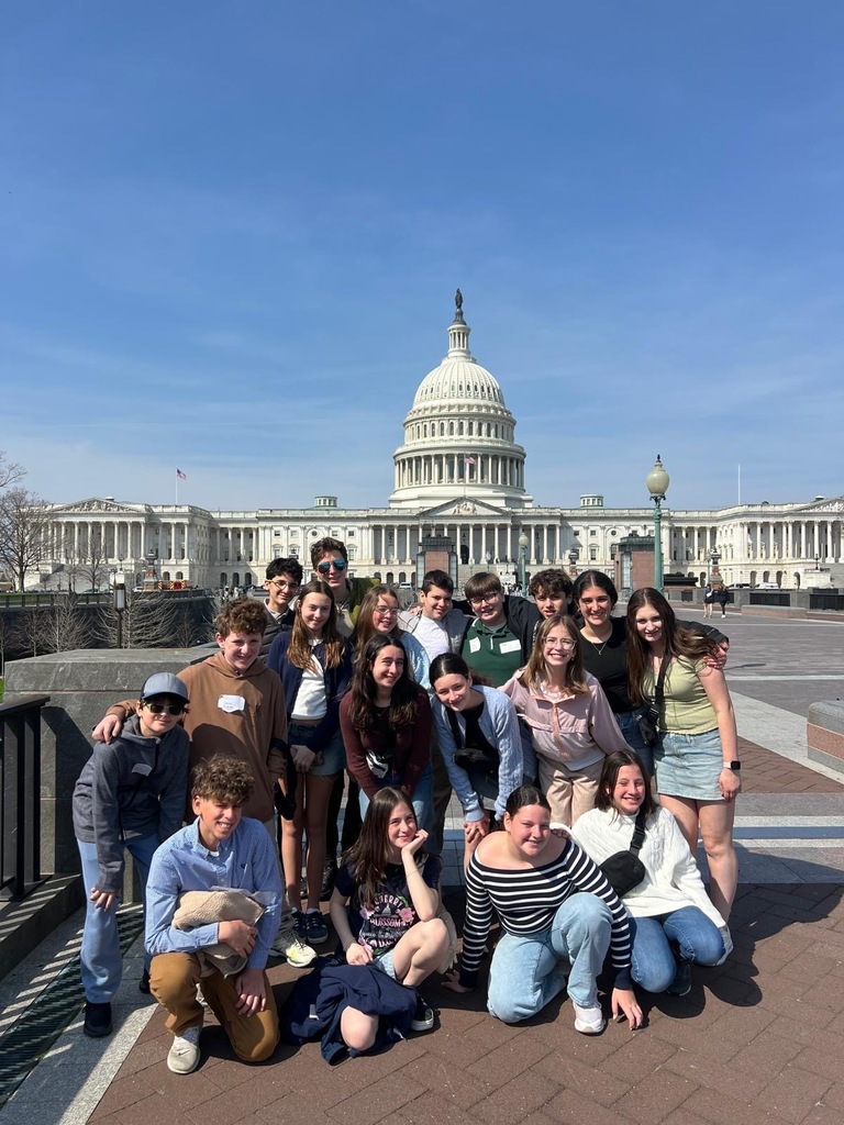 seventh grade students pose in front of United States Capitol building