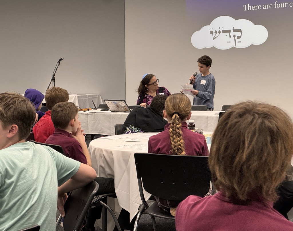 Smith student presents seder ritual four cups of wine/juice