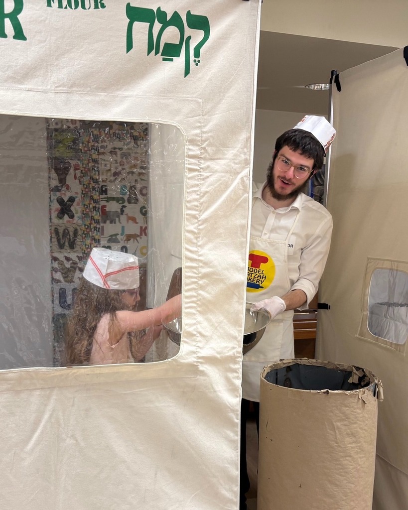 student add flour to bowl