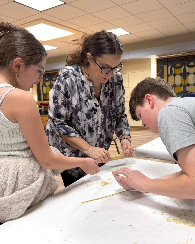 students and teacher separate grains