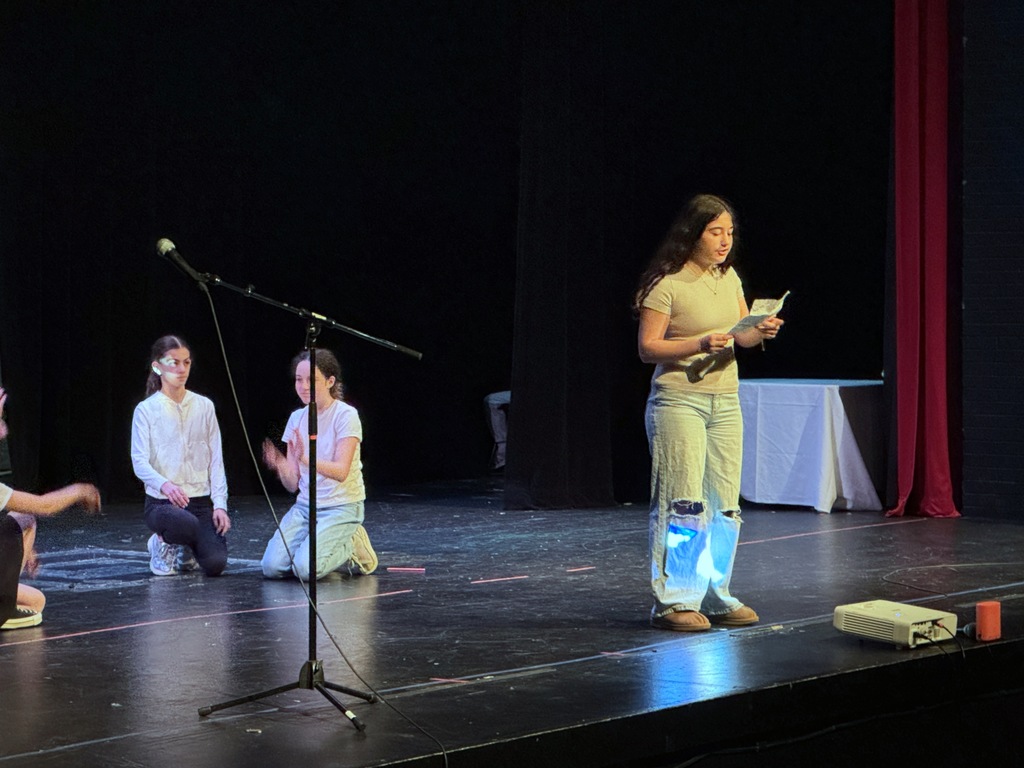 student speaks on stage