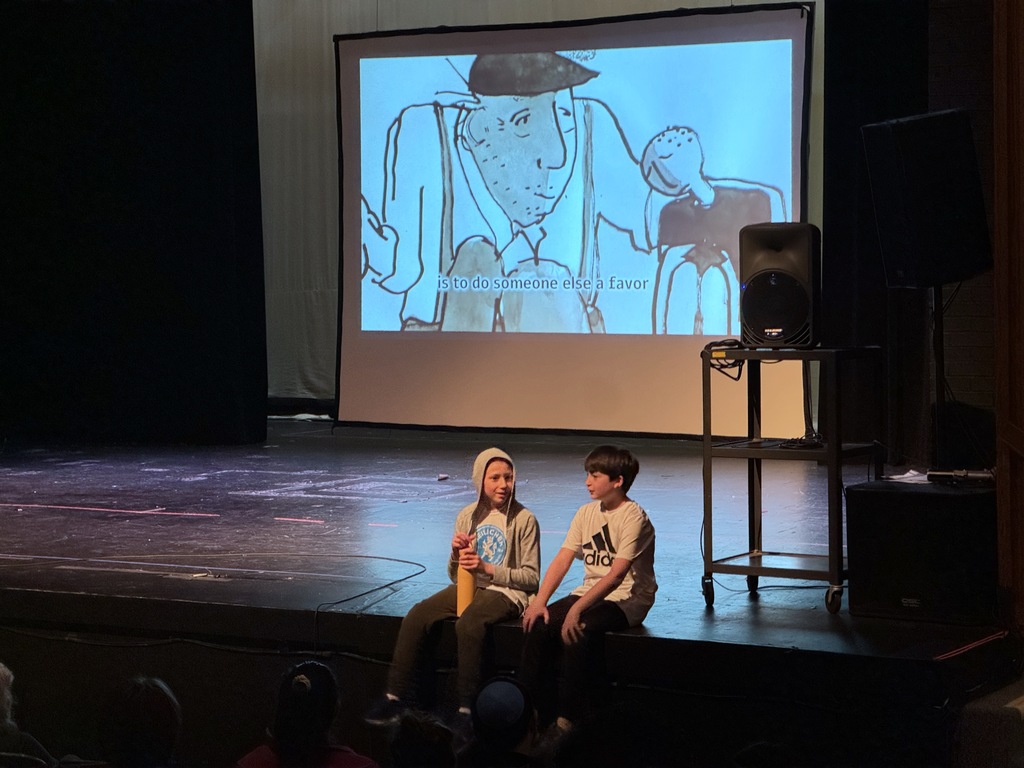 students perform skit to song
